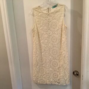 Beautiful white dress with gorgeous detailing.  Size Large.  Lined.